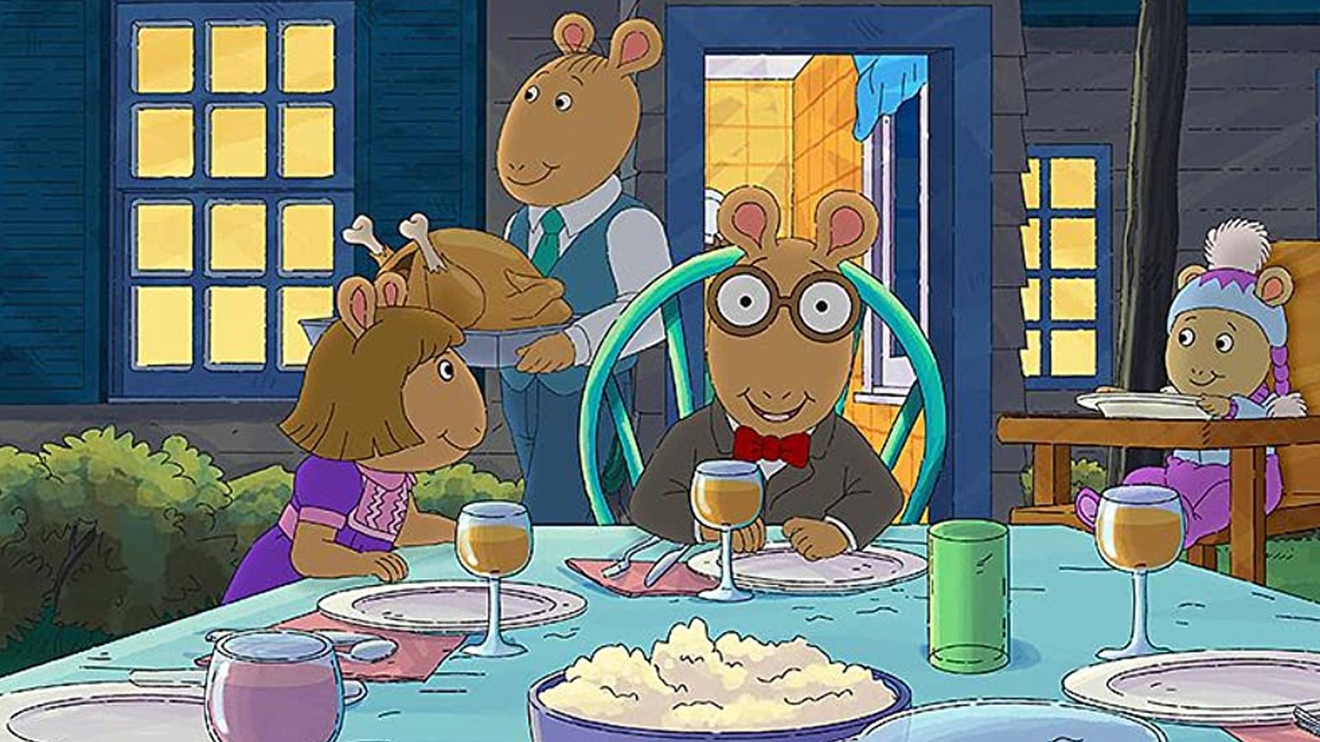 Arthur and family at Thanksgiving table