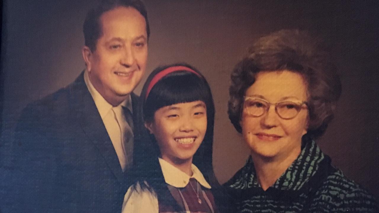 phot of young Judi with adopted parents