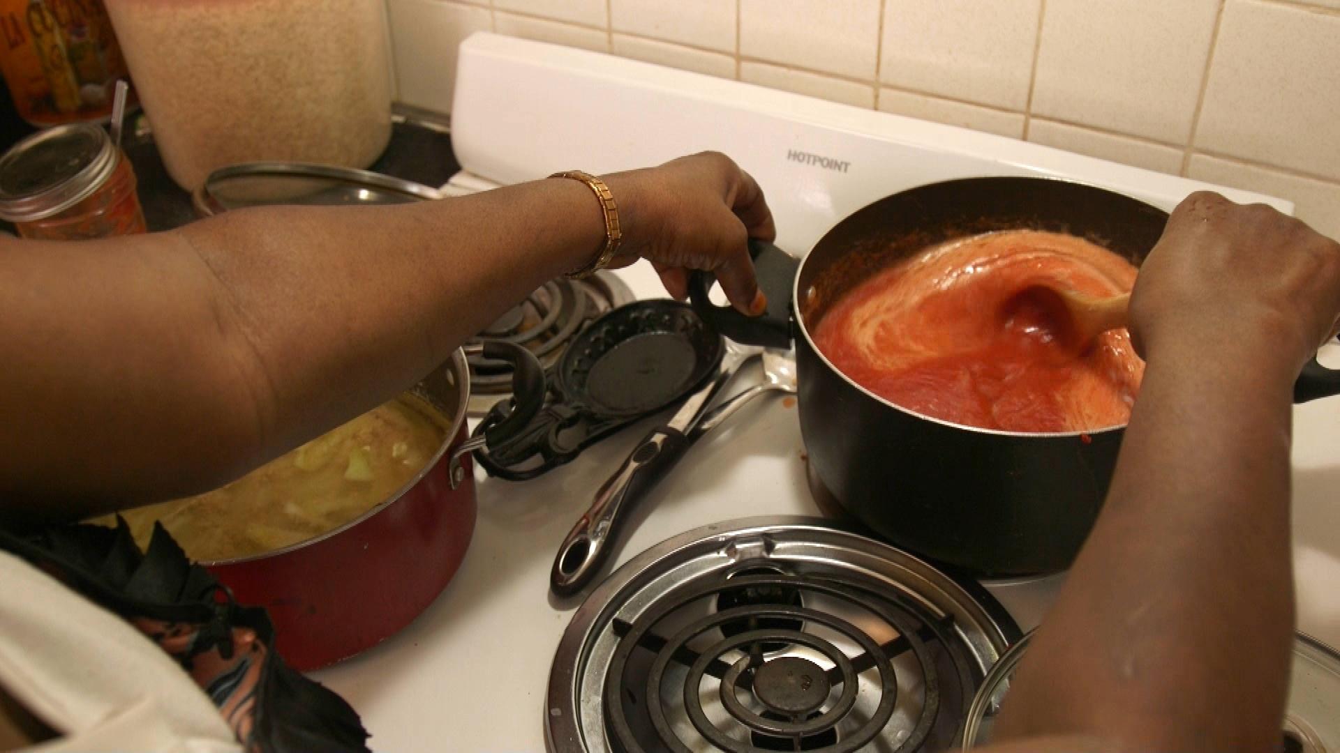 sauce simmering on stove