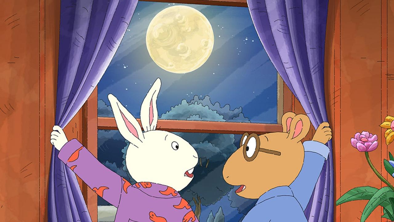 Arthur looking out window to full moon