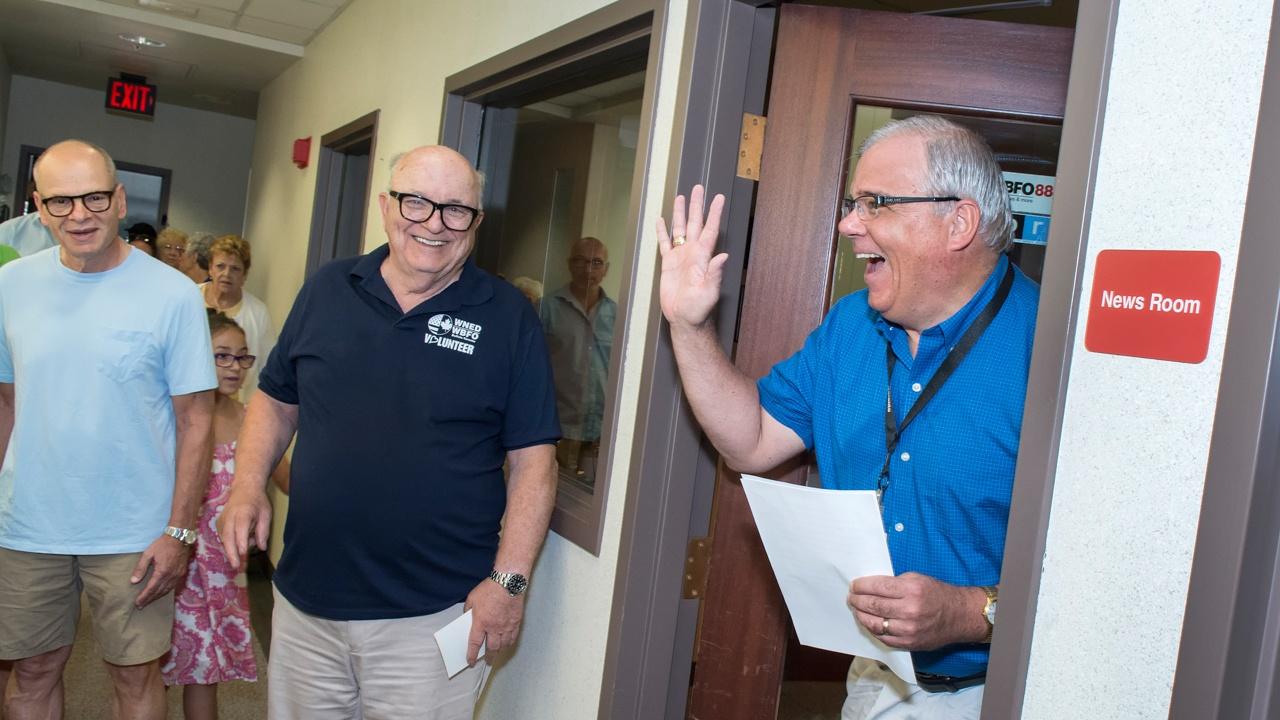 Volunteer docents conduct group tours.