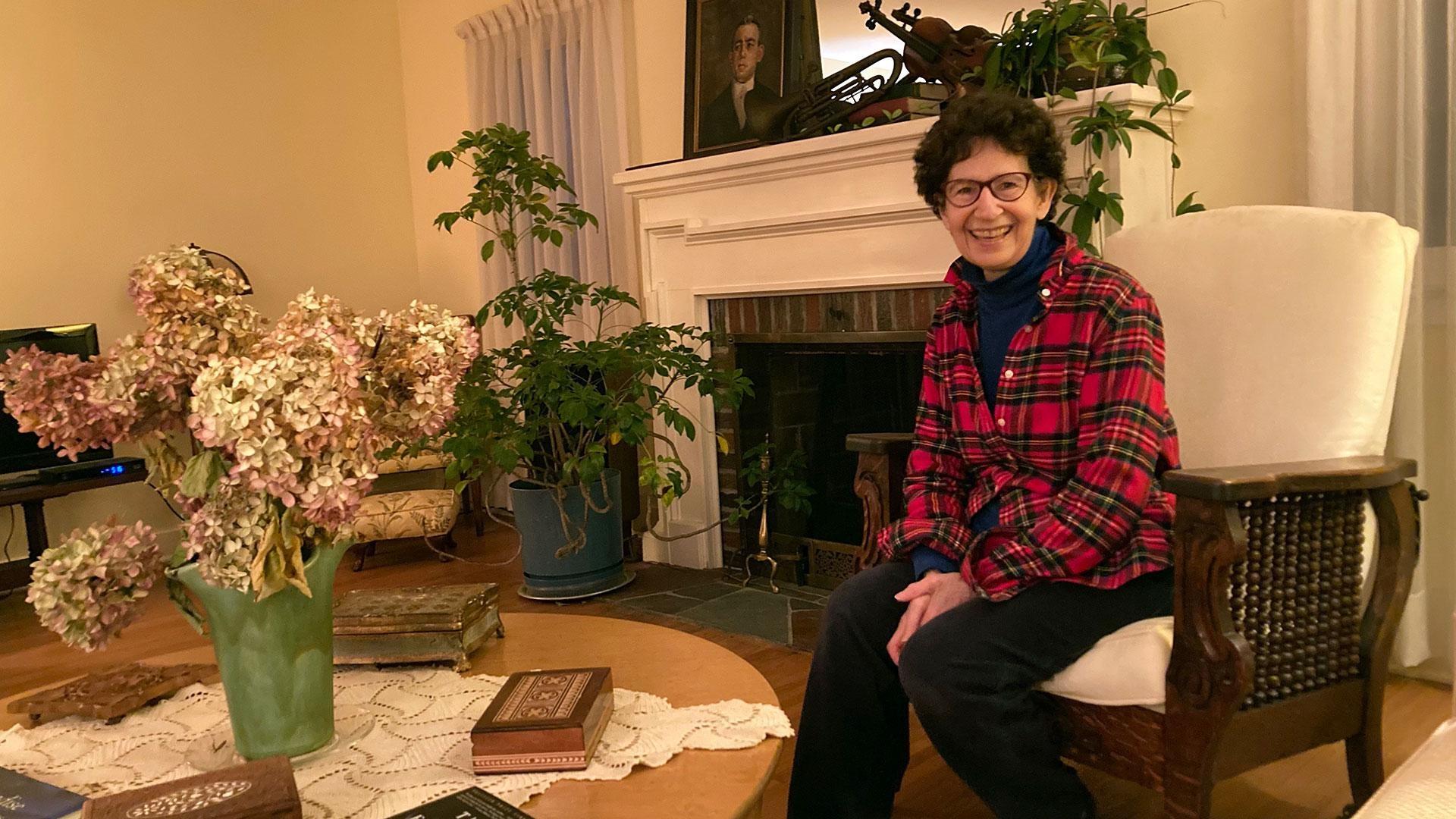 woman sitting in living room  