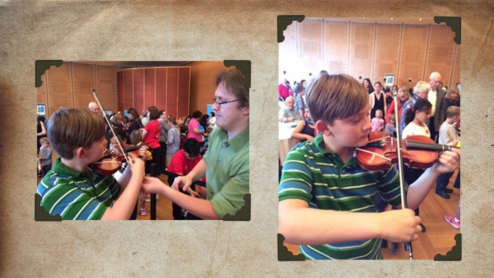 photo of a boy learning to play the violin in the Mary Seton Room before a performance of Peter and the Wolf