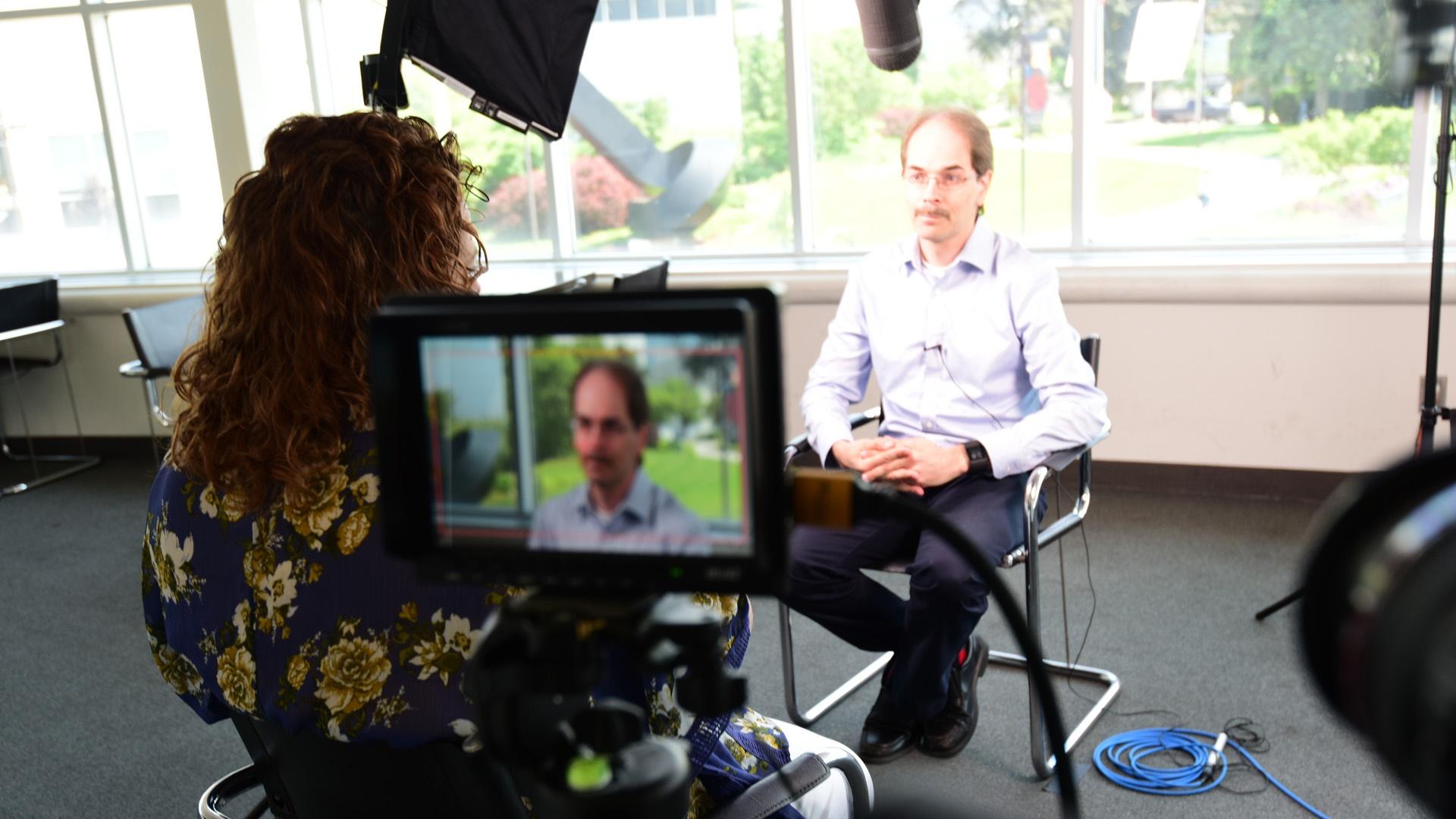 Community filmmaker Paul Dobbs being interviewed by WNED-TV