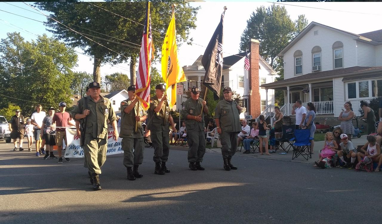 Chapter 77 marches in color guard formation throughout the entire parade route at the Canalfest parade in Tonawanda, NY.