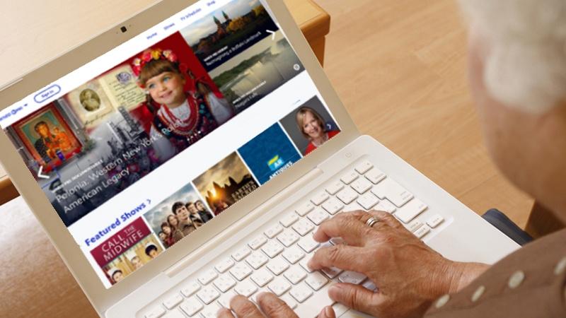 Woman watching PBS programs on-demand