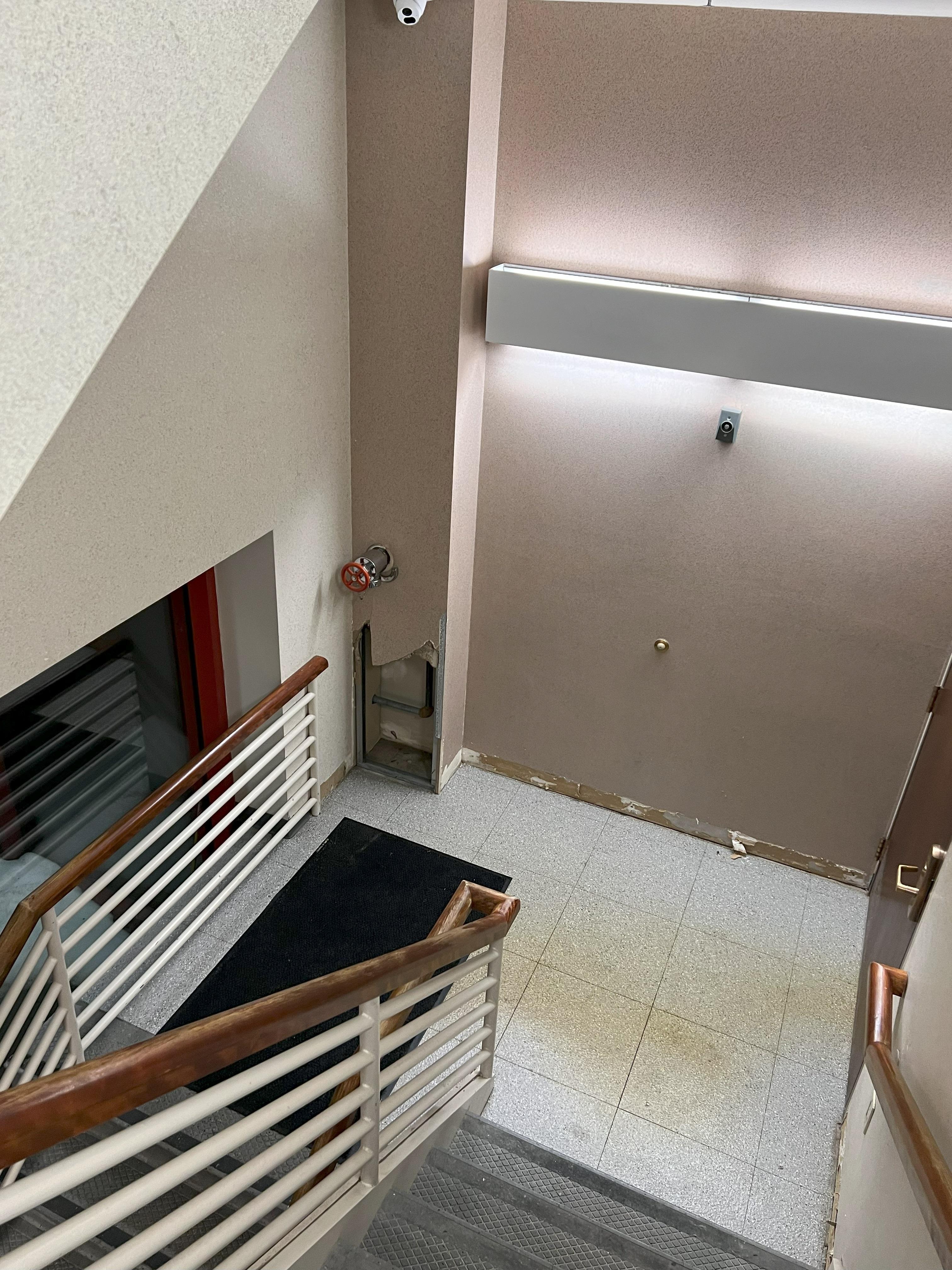 Wall and floor damage in the Stairwell – Dec. 26, 2022