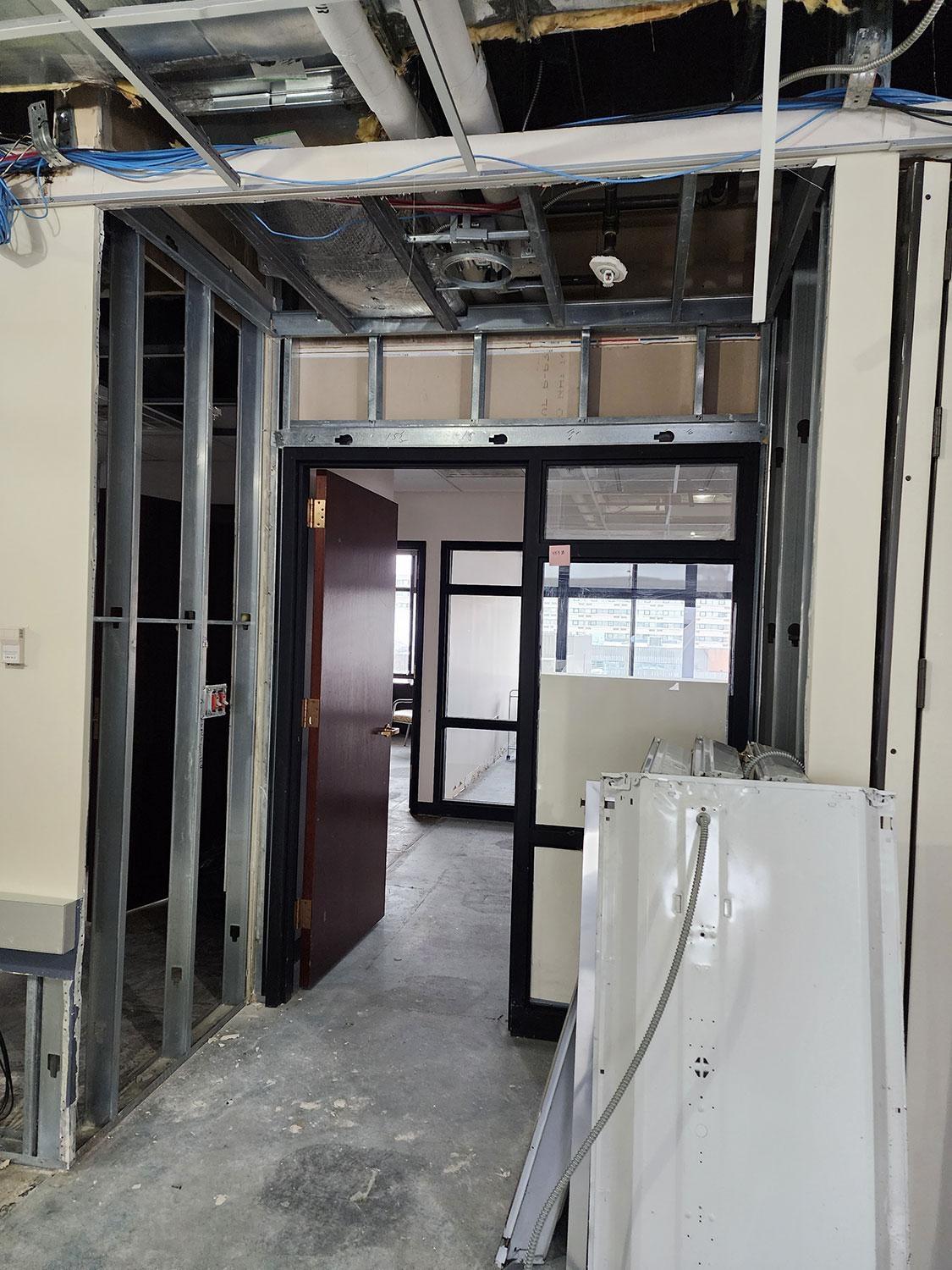 4th floor flooring, ceiling and wall removal in hallway –  March 15, 2023