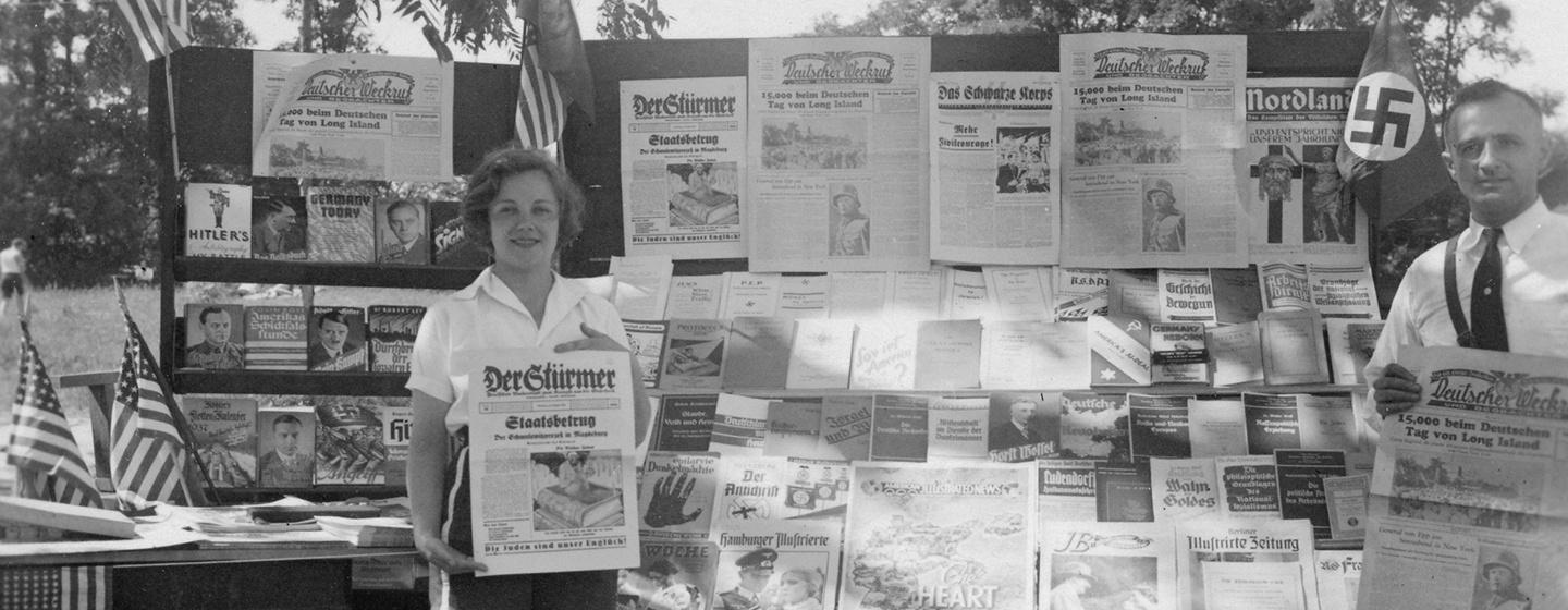 Girl at a Nazi Propaganda stand, Camp Siegfried, Yaphank, New York, September 1936.