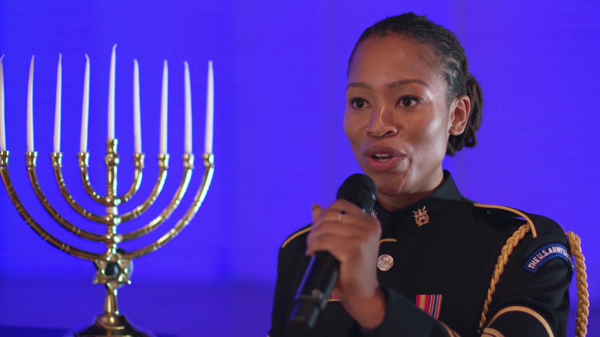 Armed forces members celebrate Hanukkah through song