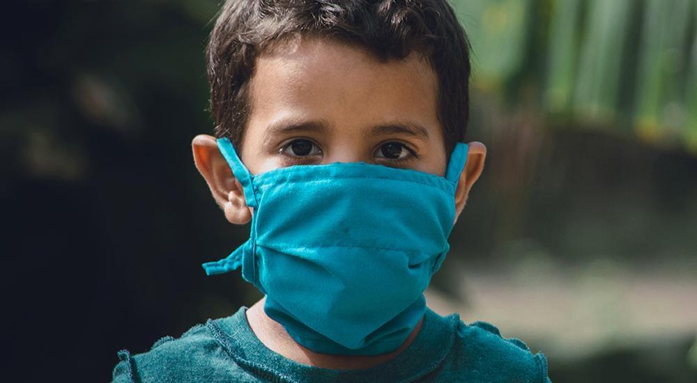 Child wearing a mask