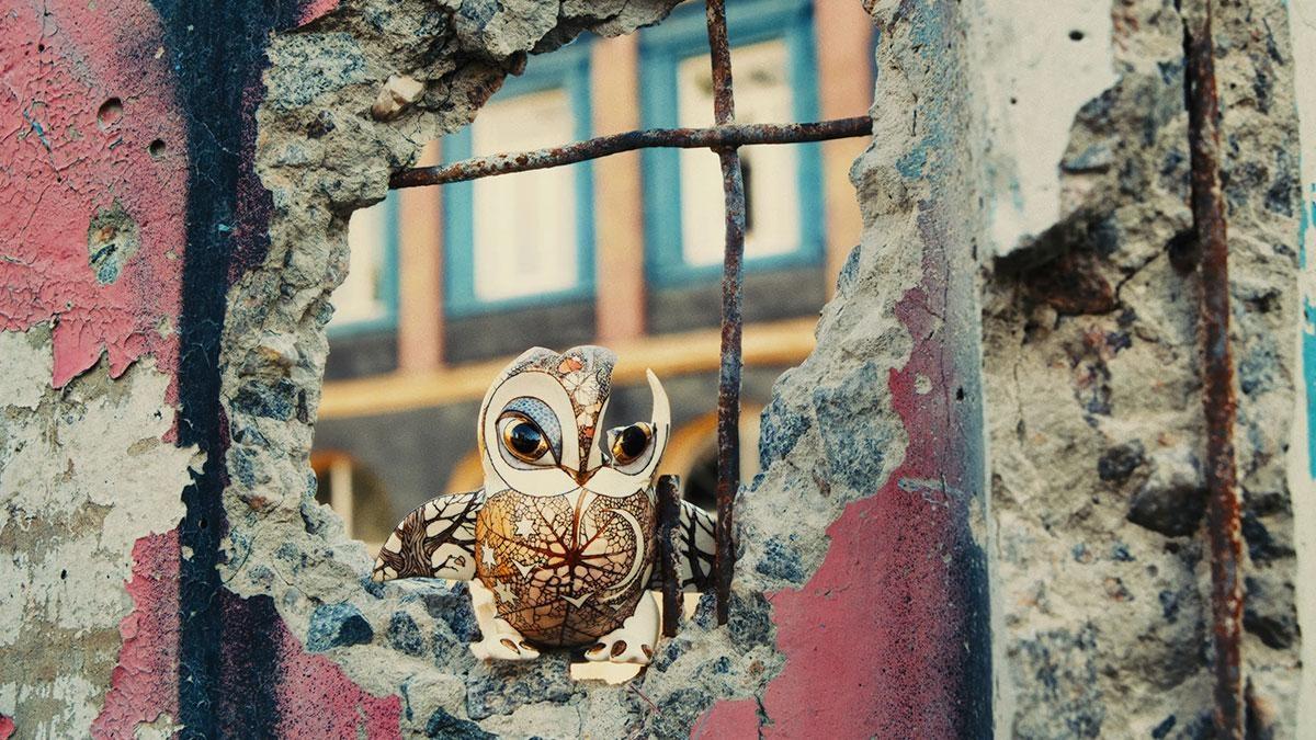 Confronting war, Ukrainian artists pick up arms while finding strength through art.
