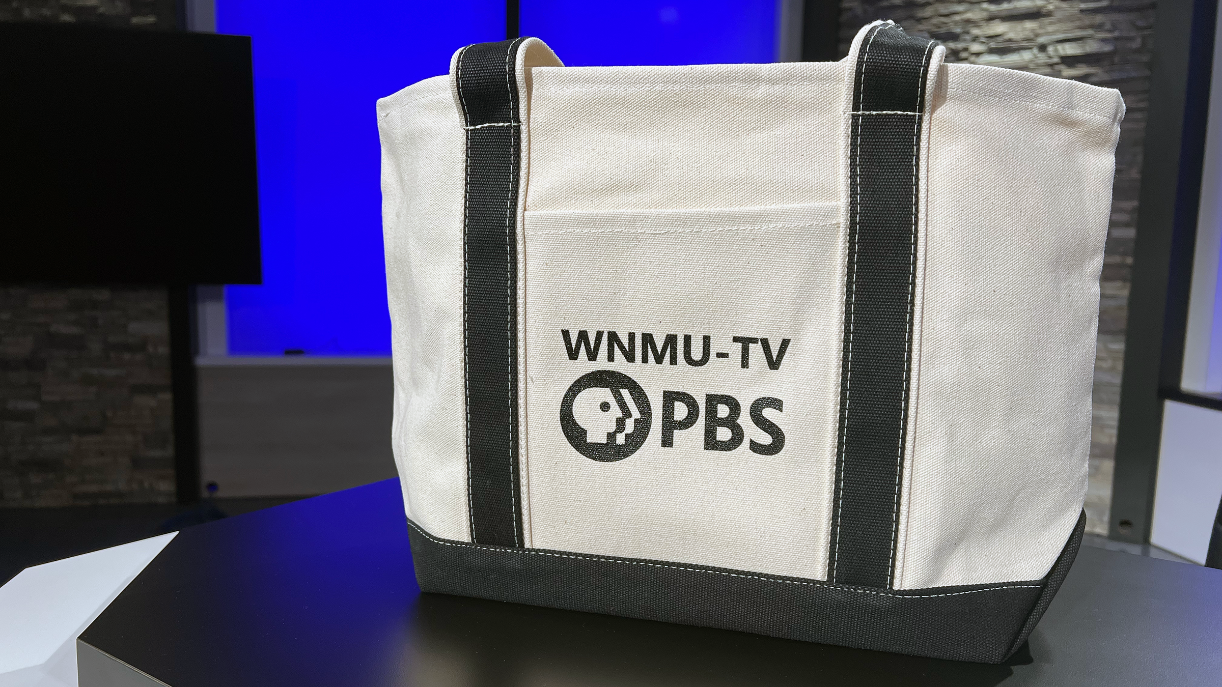 WNMU-TV Cotton Canvas Tote with black handles and logo in the middle