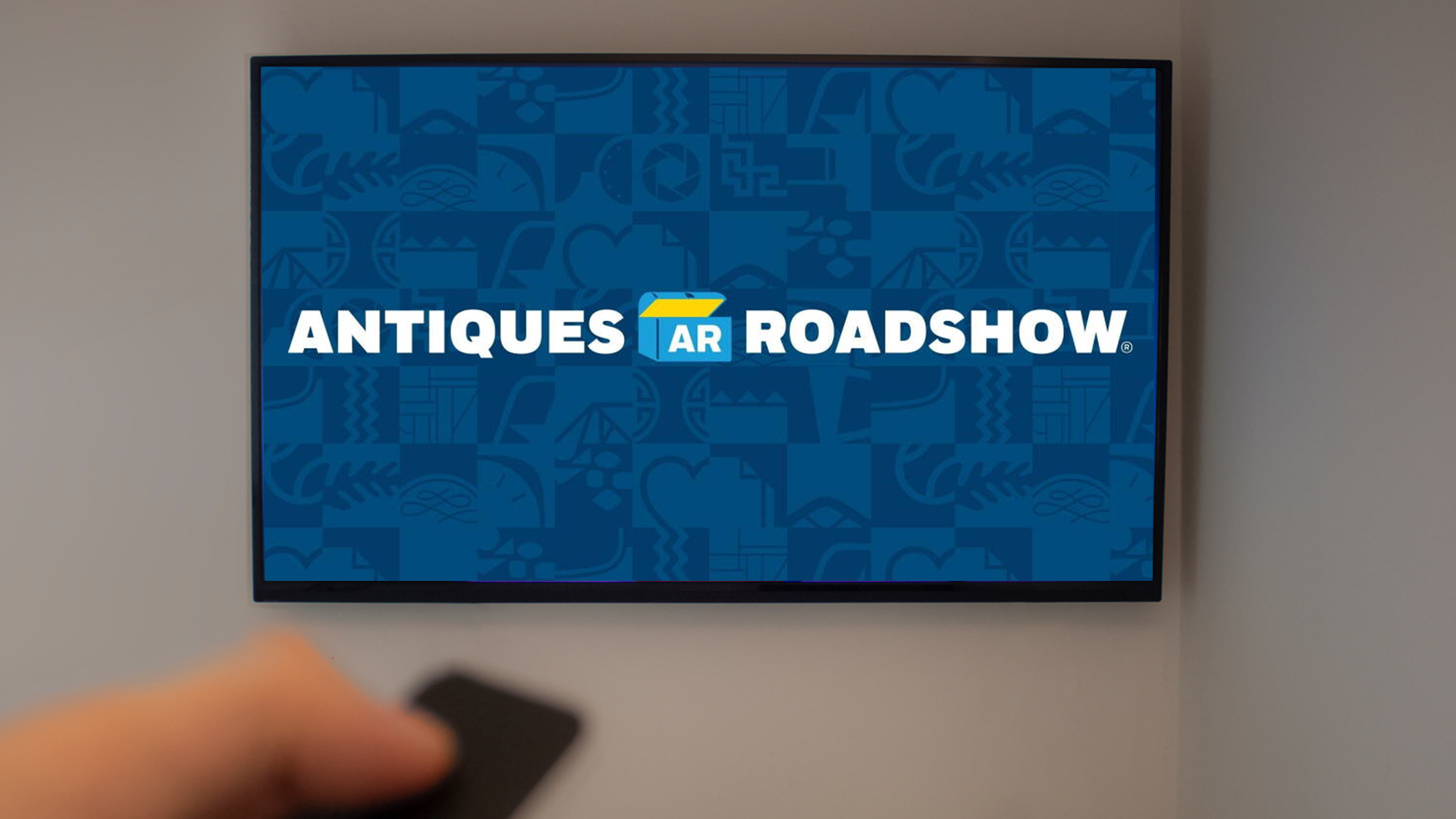 TV screen with Antiques Roadshow logo displayed