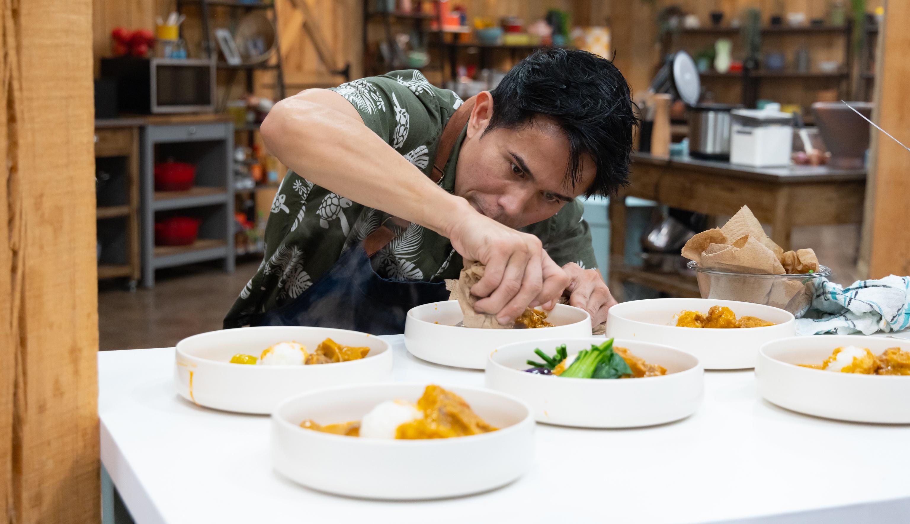 Rex preparing his family's traditional dish
