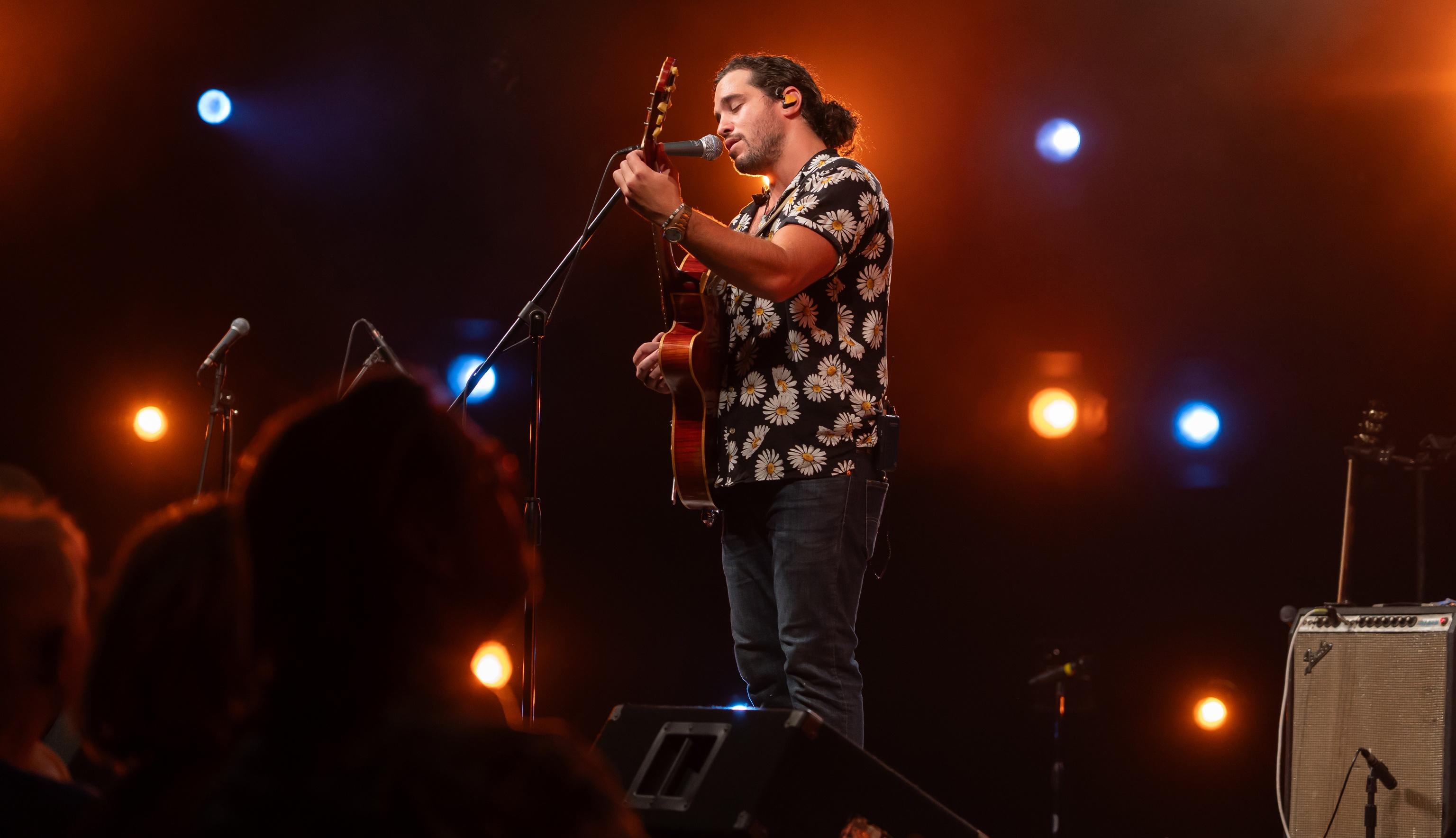 Ben Loftin singing onstage