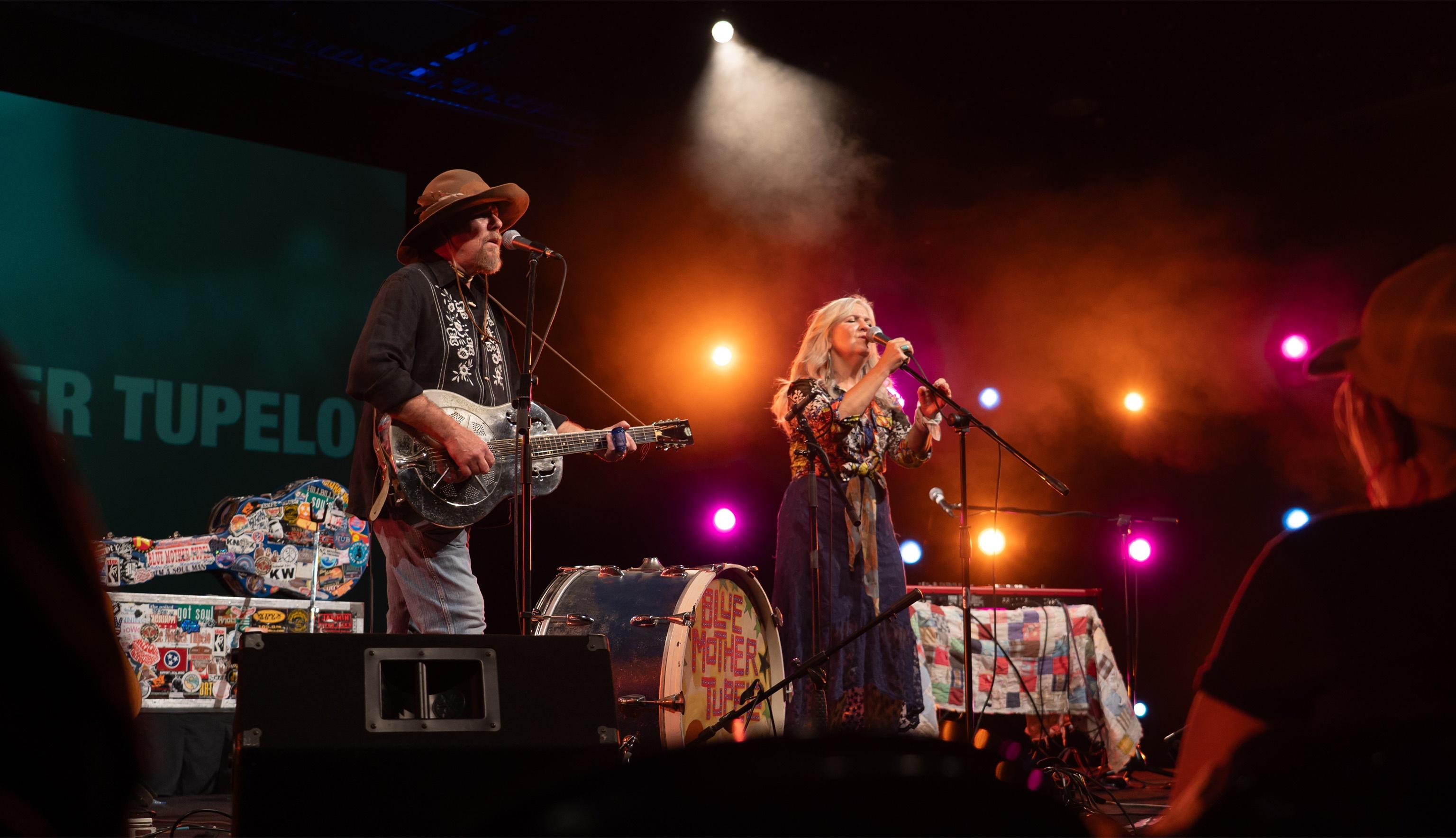 Blue Mother Tupelo Ricky and Micol Davis performing on stage