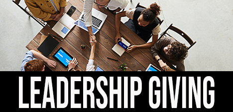 "Leadership Giving" image of people around a table