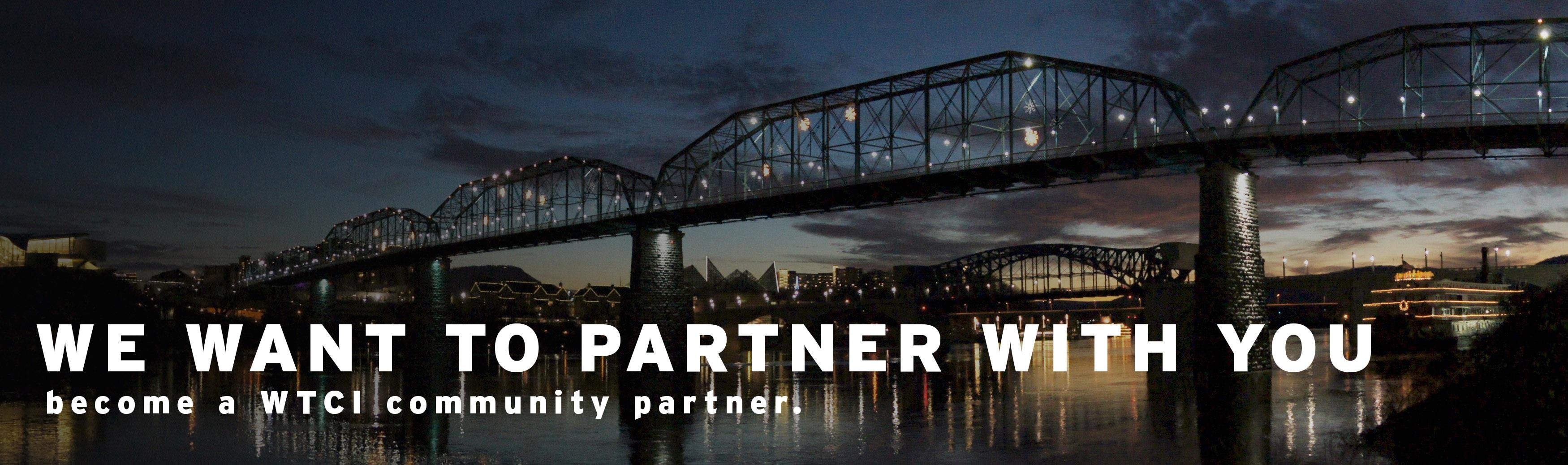 Image of Tennessee River and bridges at dusk with text that reads "We want to partner with you. Become a WTCI community partner"