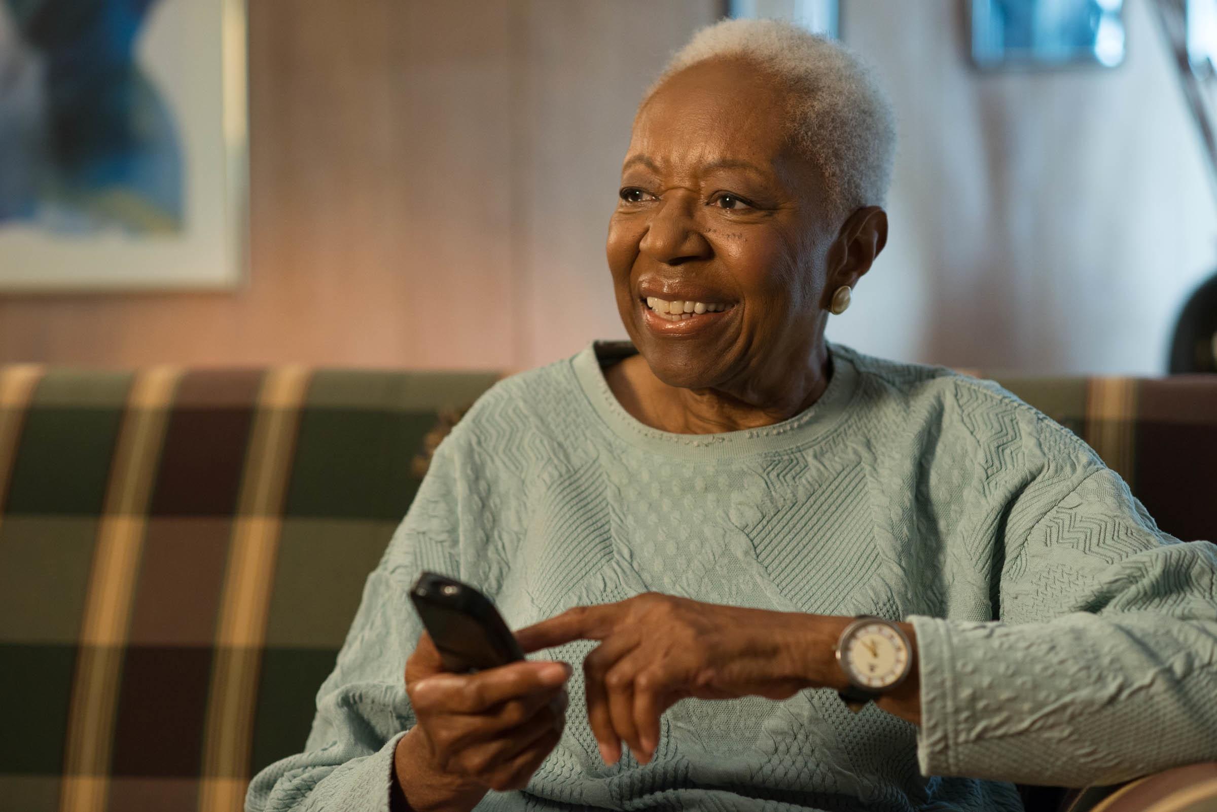 Woman holding a remote control