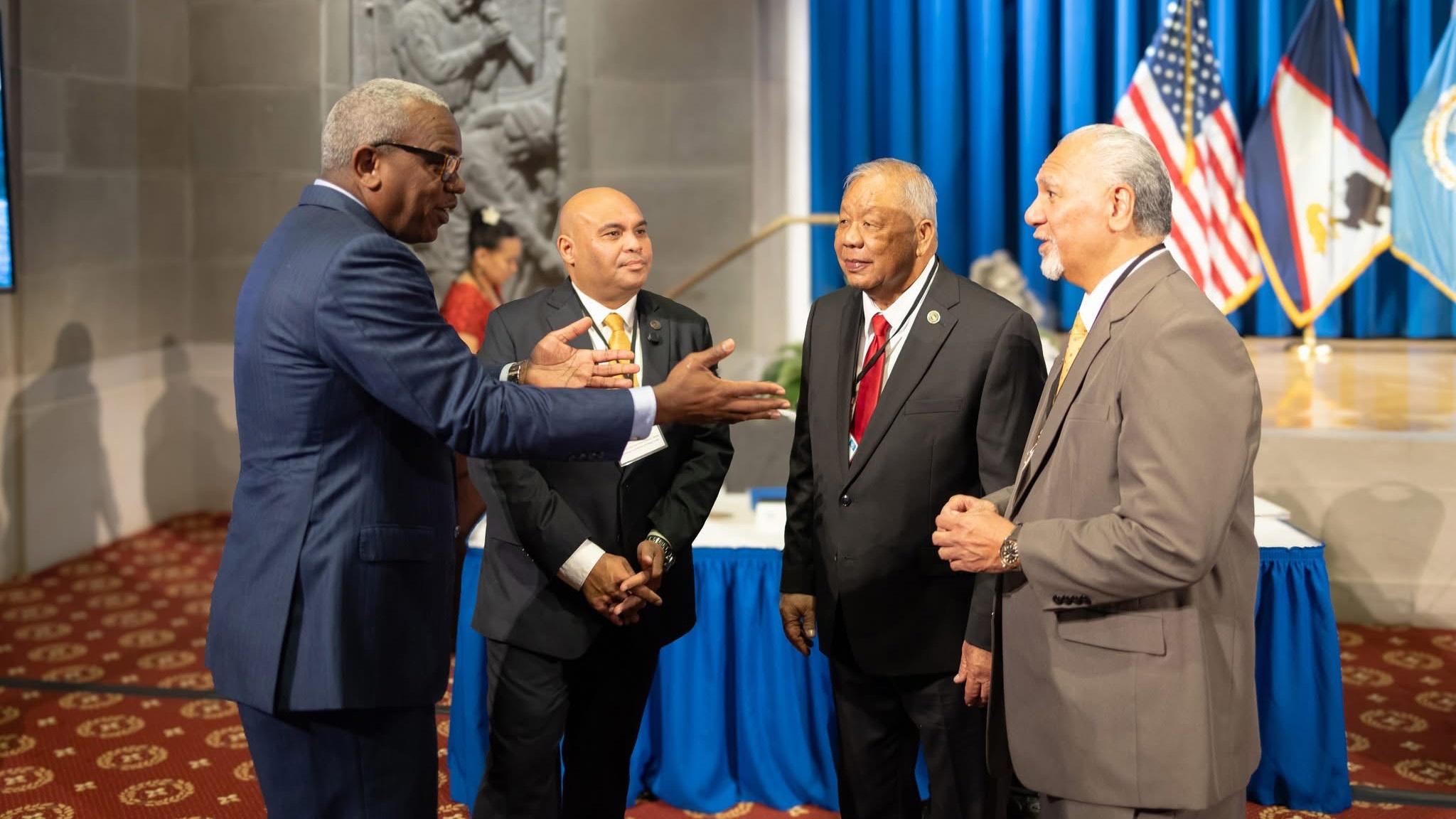 Governor Albert Bryan Jr, speaks with (from left to right) Guam's Lieutenant Governor Josh Tenorio, CNMI Governor David Apatang, and American Samoa Governor Pula'ali'i Nikolao Pula 