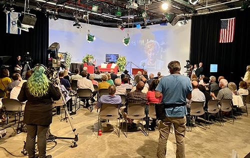 A Wide shot of the WTVP studio during the event