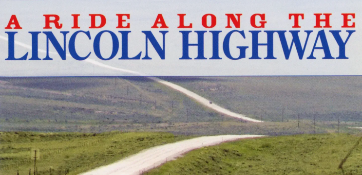 The pale beige pavement of the Lincoln Highway stretches across rolling green hill-country. The documentary title, A Ride Along the Lincoln Highway is superimposed over the scenery.