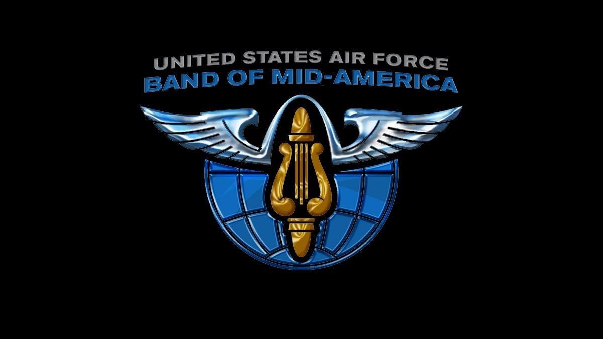 The official logo of the united states air force band of mid america; a harp with overarching wings before a blue sphere on a dark background..