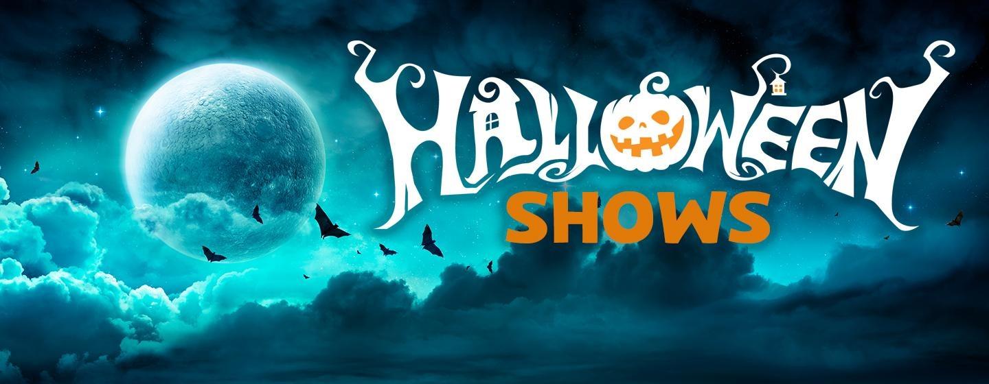 Halloween Shows banner with a glowing full moon, turquoise clouds, bats, and spooky stylized lettering.