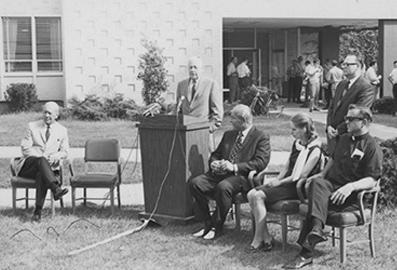 Channel 47 taped its own groundbreaking today at Bradley University. Participants are from left, Dr. T.W. Van Arsdale, president of Bradley; Speaking, George Luthy, co-chairman of the station's campaign advisory board; U.S. Rep. Robert H Micheal; Mrs. George Neff, Rev. Eugene Finnell, Supt. of Schools for the Peoria Catholic Diocese and standing Philip Weinberg, President WTVP (Wednesday, September 2, 1970)