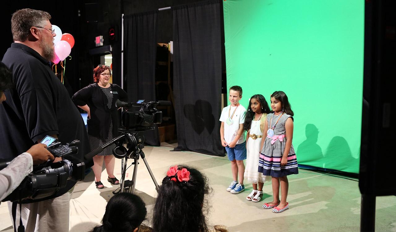 Three 2017 Writers Contest Winners Pose for a shot in the studio