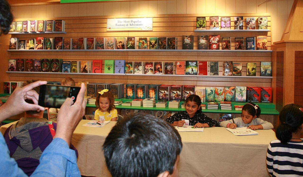 Winners signing their books at the 2017 Writers Contest Little Local Authors Event held at Barnes and Noble