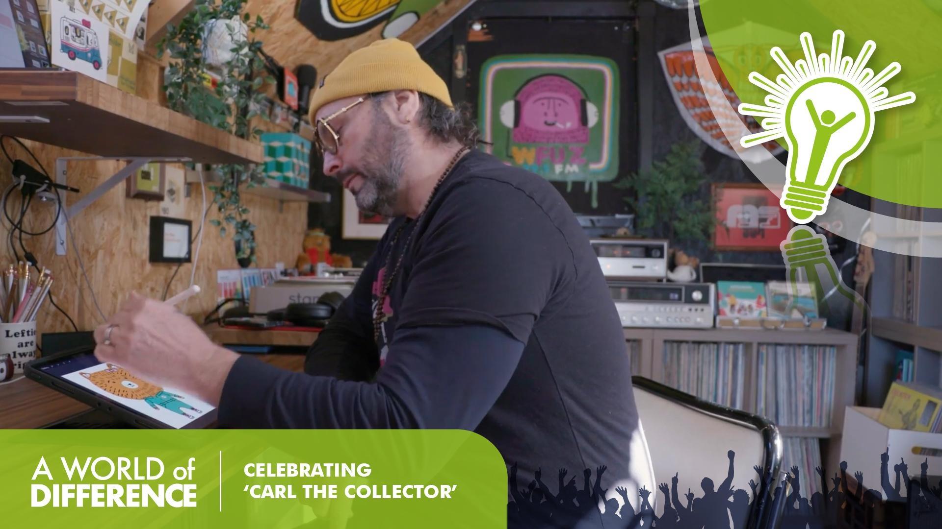 Picture book author Zachariah OHora animates a scene from "Carl the Collector" at his desk. 