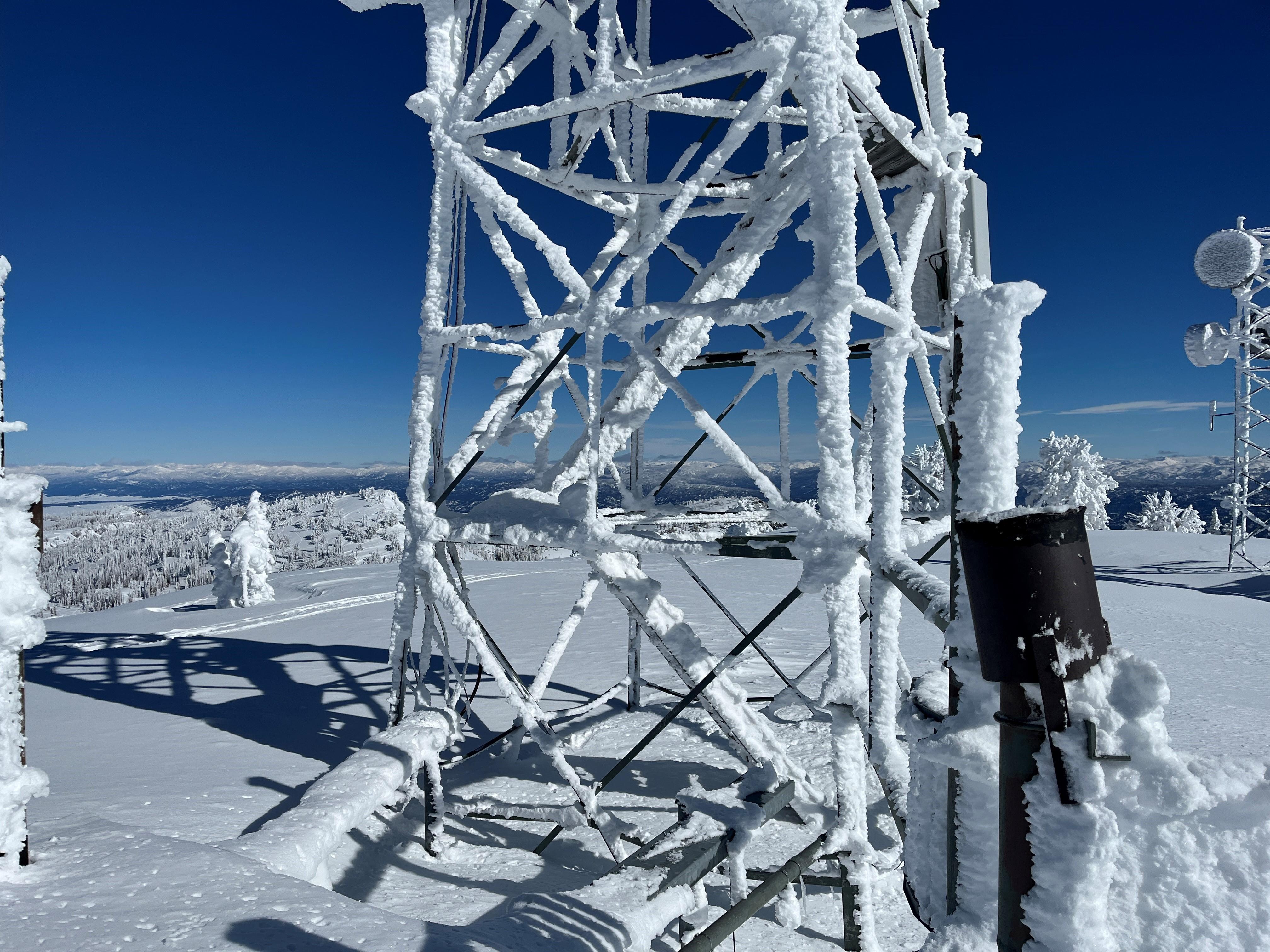 Snowbank Tower site is snow covered to roof level.