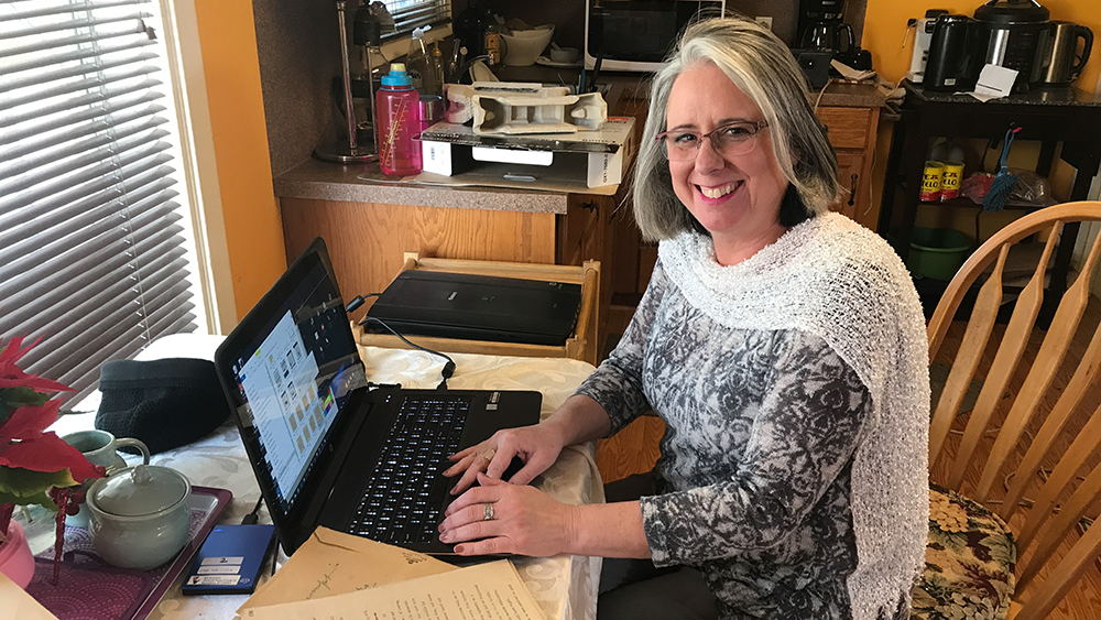 Marcia Franklin sitting at her computer