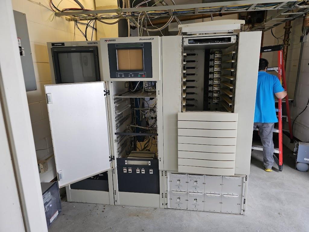 Engineers working on KIPT equipment, July, 2025