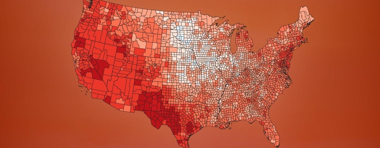 A map of counties in the United states with different shades of read to indicate summer temperatures from 1970-2024.