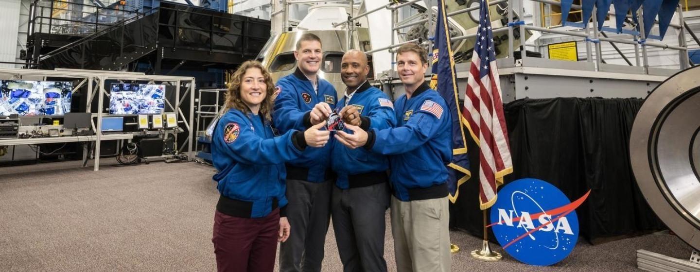 Commander Reid Wiseman, Pilot Victor Glover, and Mission Specialist Christina Koch, all from NASA.