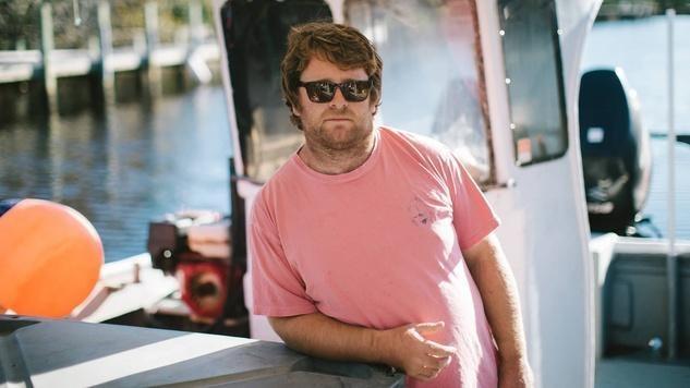 morty gaskill standding on sunny boat deck