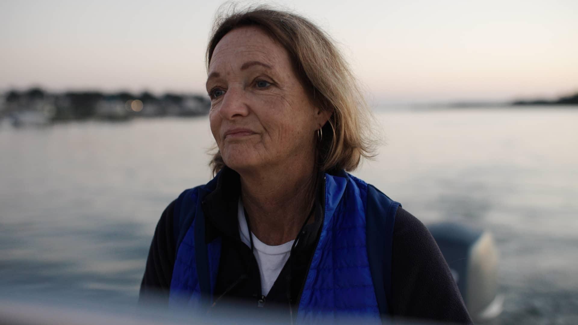 tracy skrabal on motor boat at evening