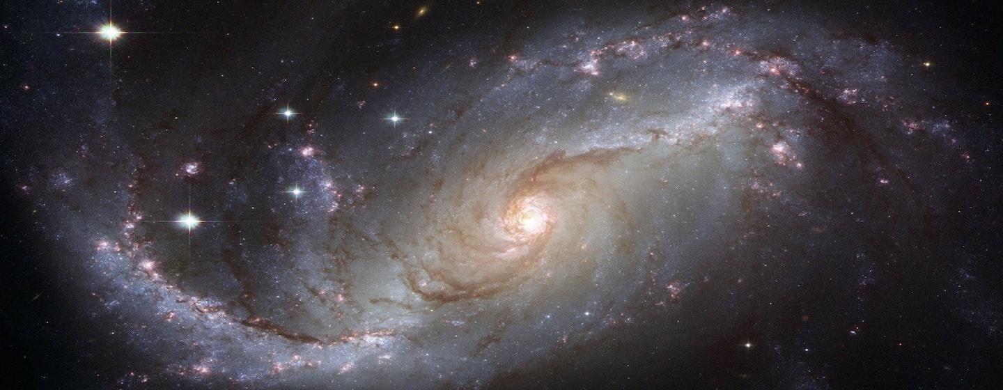 cosmos picture of milky way galaxy spiral with stars high res balck pink purple and blue colorful