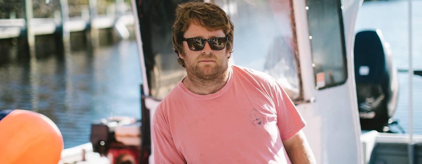 morty gaskill in motor boat sunny deck