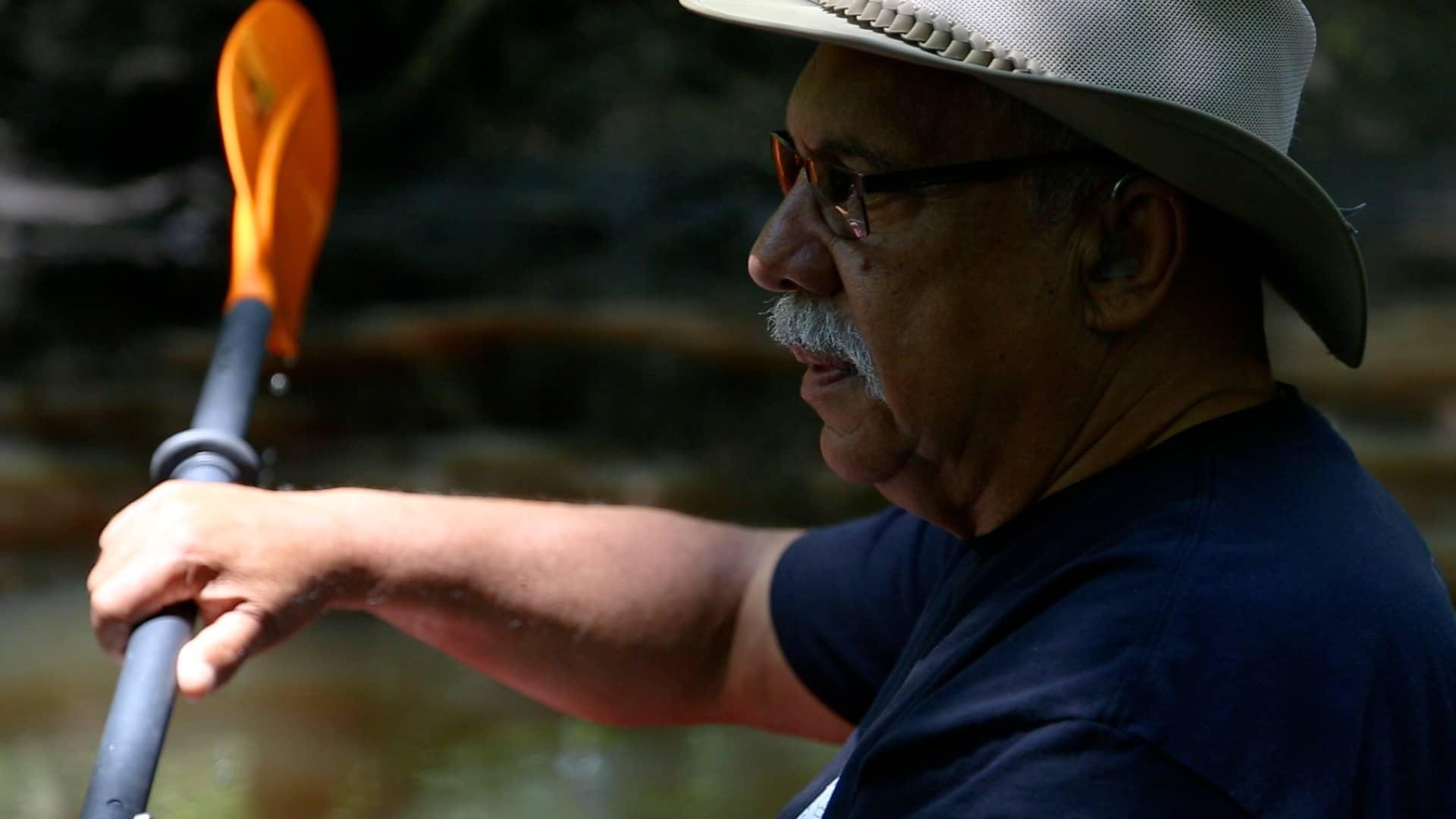 Coharie Tribal Administrator Greg Jacobs guides a group of visitors down the Great Coharie River. Photo by Meredith Browne.
