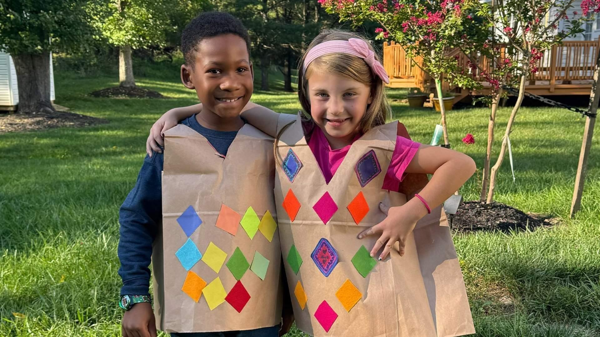 Two children wearing argyle vests inspired by Carl the Collector's vest.