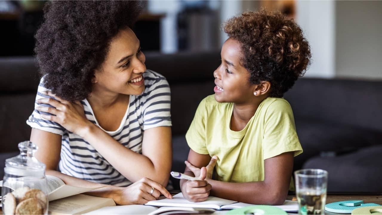 Smiling parent with child