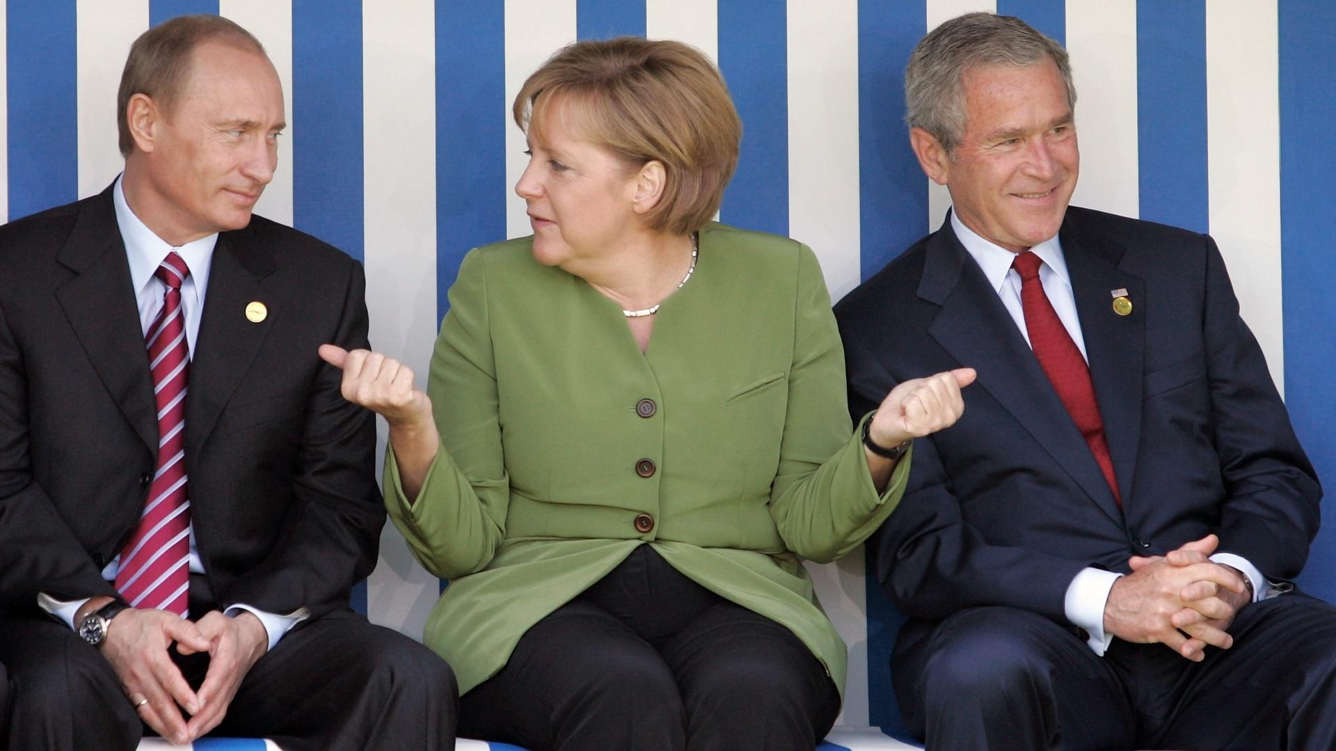 Angela Merkel with Vladimir Putin and George W. Bush.