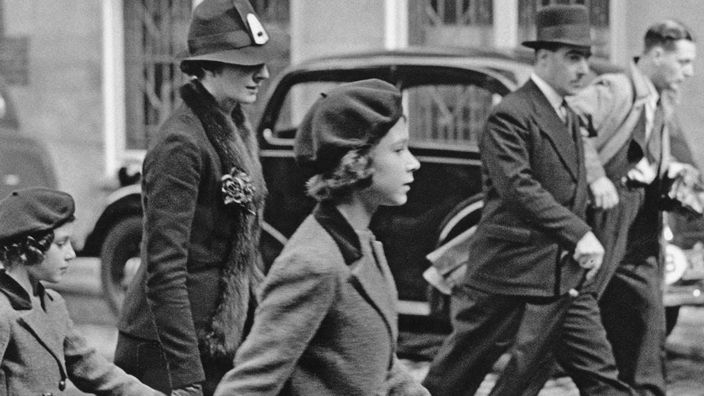 Royal governess Marion Crawford accompanies Princesses Elizabeth and Margaret to the YWCA.