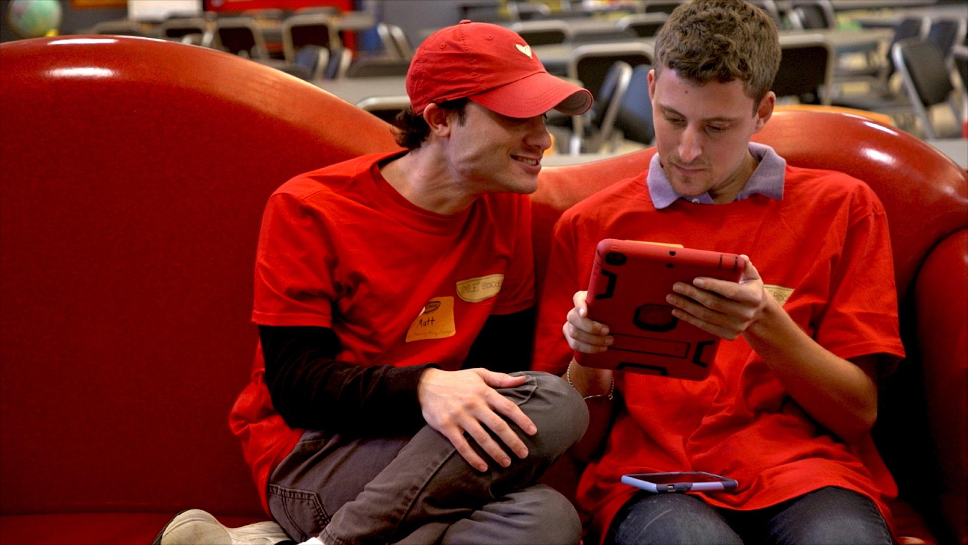 Mickey and his friend Matt hanging out and playing Scrabble on Matt’s tablet.