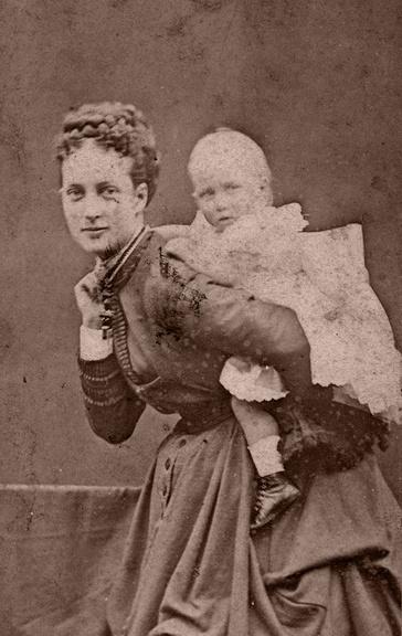 Alexandra, Princess of Wales and one of her sons, possibly the future King George V.