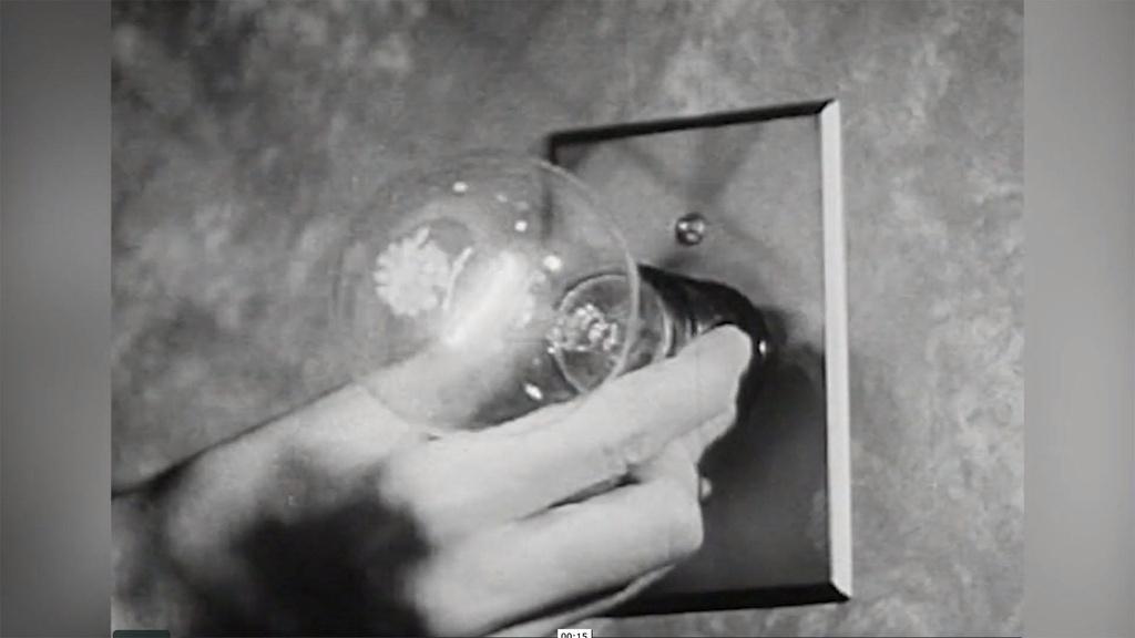 Black and white image of an early light bulb.